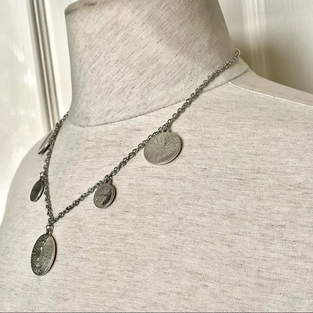 Silver tone disc necklace
